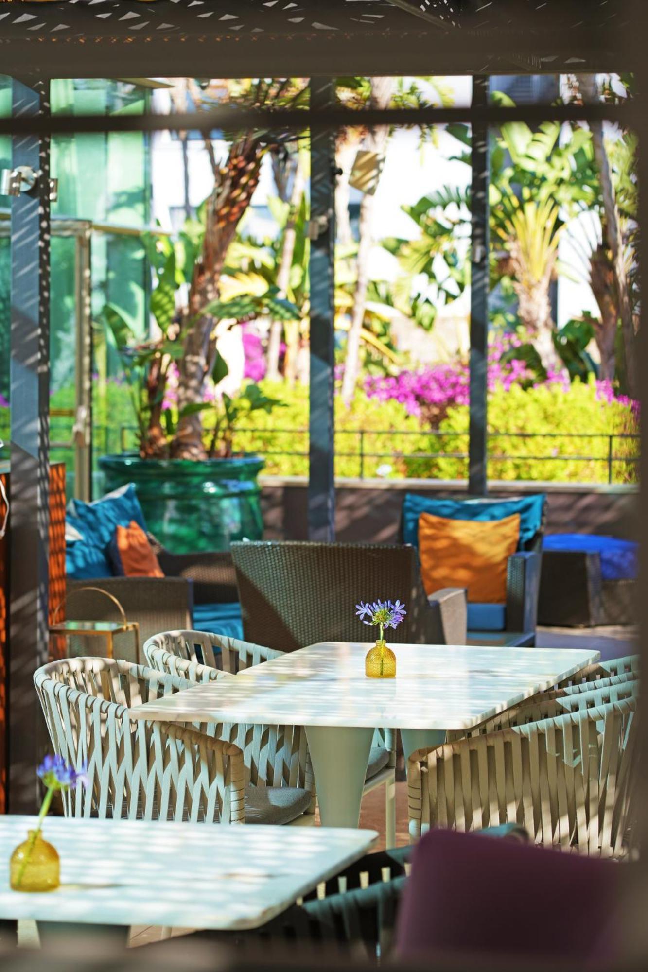 Aguas De Ibiza Grand Luxe Hotel - Small Luxury Hotel Of The World سانتا أيُلاريا ذيس ريو المظهر الخارجي الصورة The Garden Bar